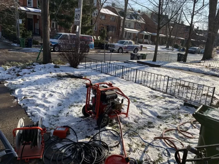 Drain-cleaning equipment set up outside before residential line clearing work begins